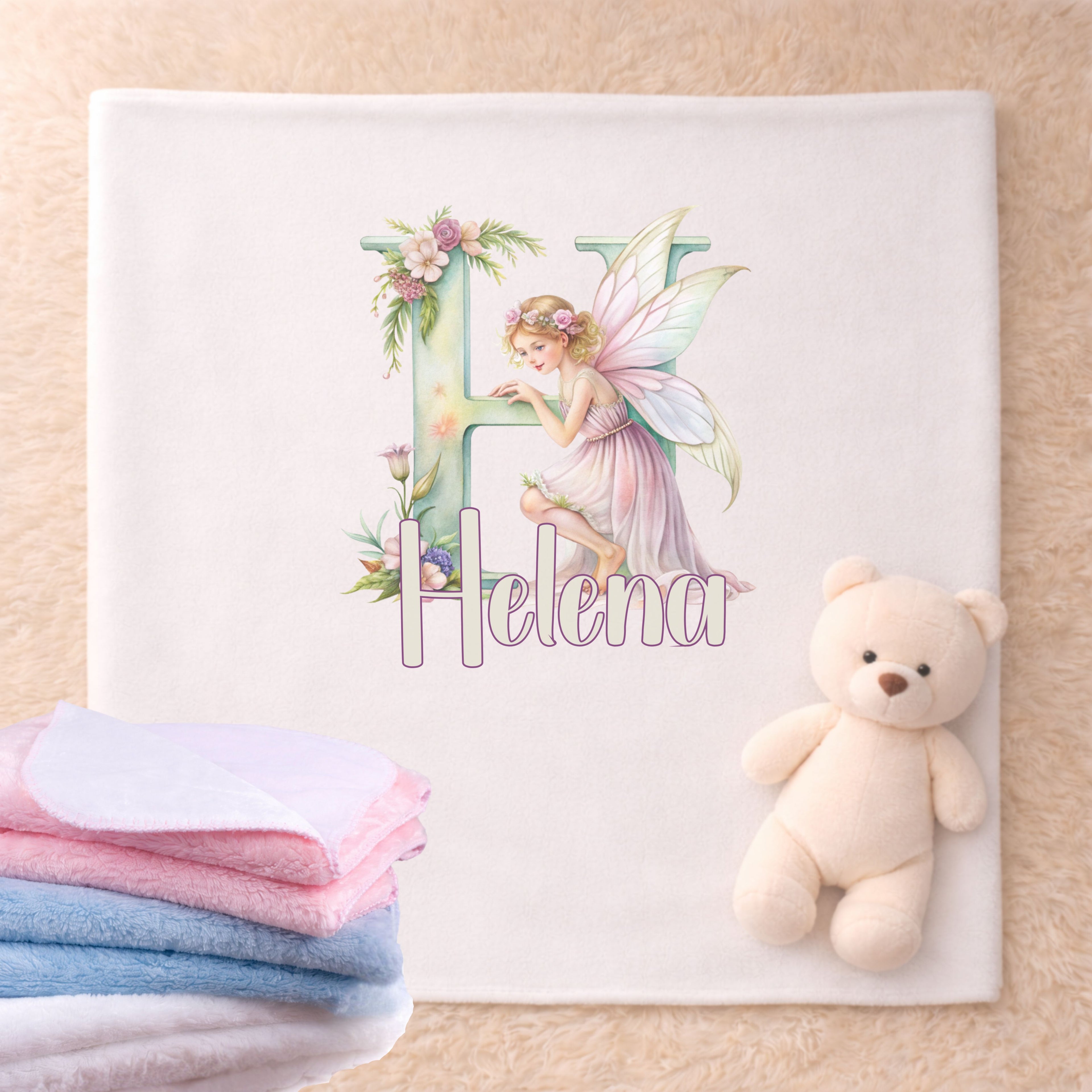 Babydecke personalisiert mit Fee Design und zarten Farben als kuschelige Decke für Mädchen
